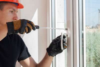 Professional Window Glazier Repairing Window